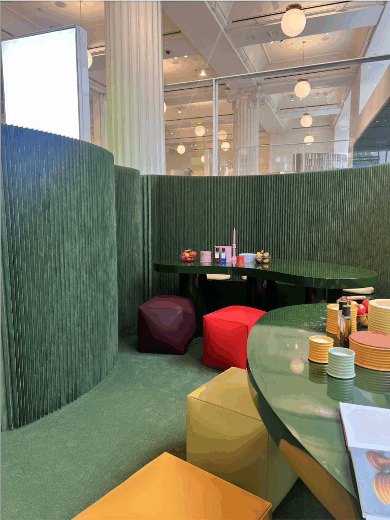 immersive beauty pop up experience at a store with colorful displays